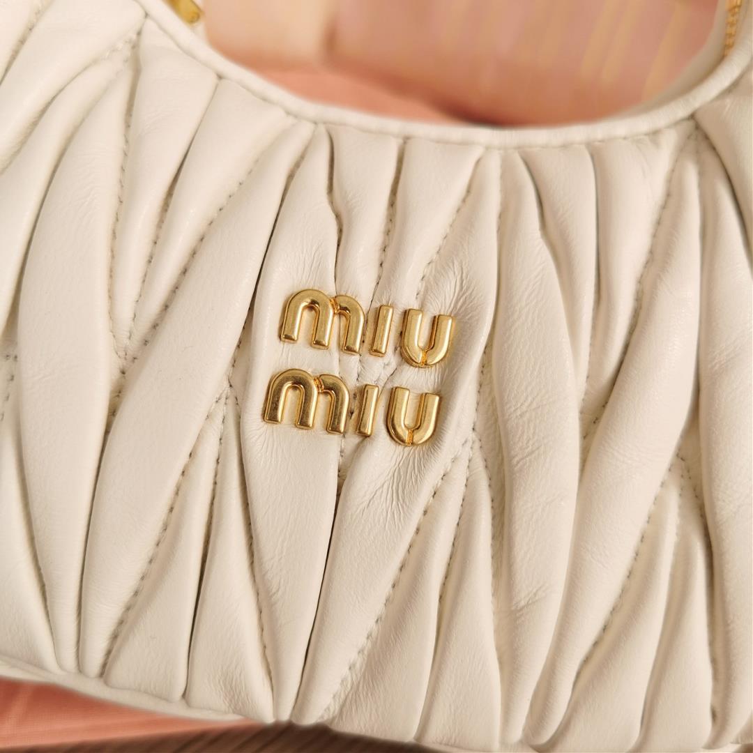 Small size The M familys new mini MiuWander handbag features imported lamb skin classic brand