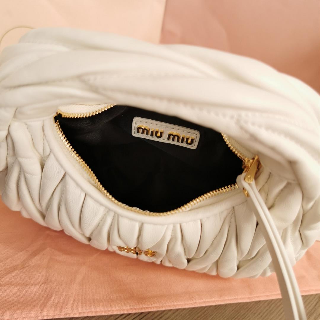 Small size The M familys new mini MiuWander handbag features imported lamb skin classic brand