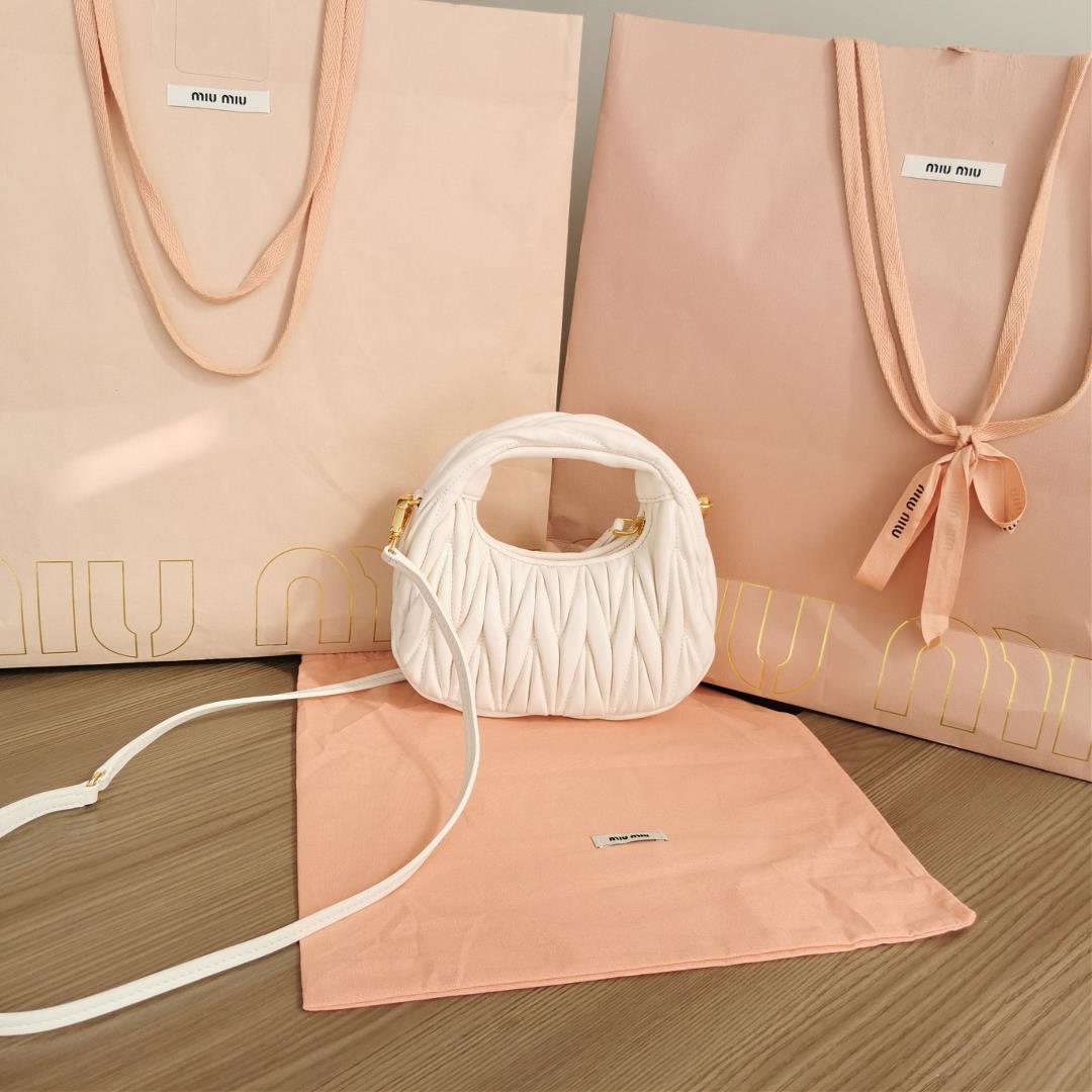 Small size The M familys new mini MiuWander handbag features imported lamb skin classic brand
