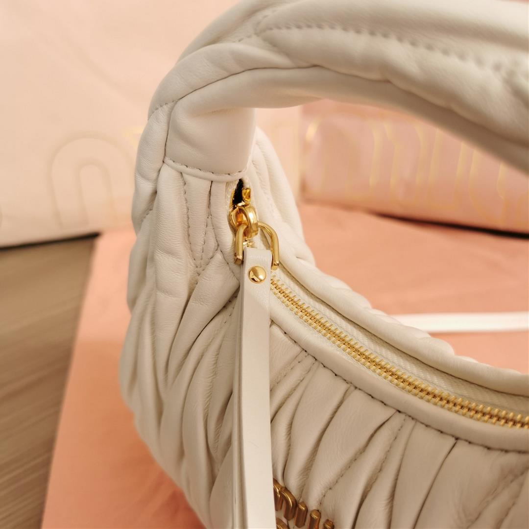 Small size The M familys new mini MiuWander handbag features imported lamb skin classic brand