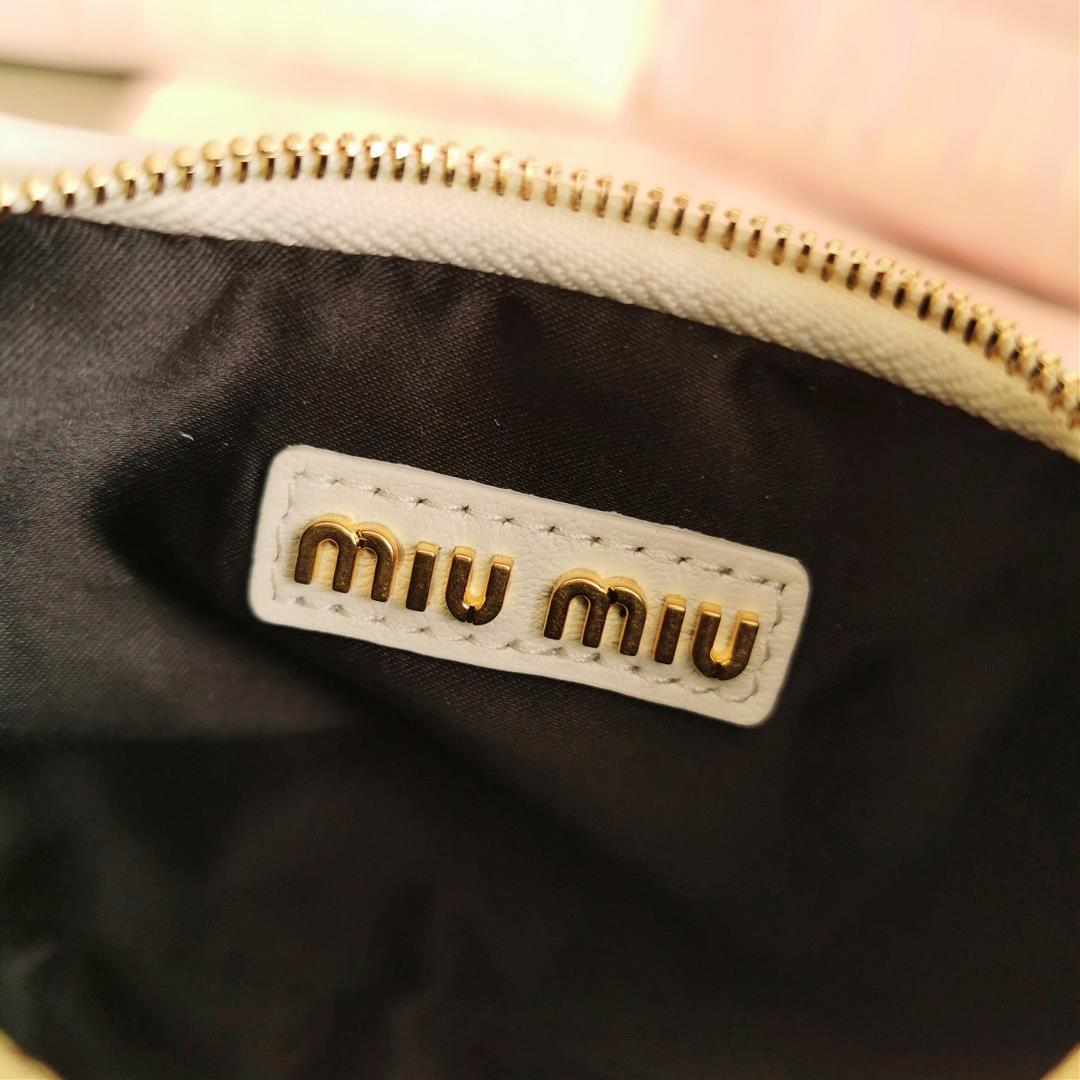 Small size The M familys new mini MiuWander handbag features imported lamb skin classic brand