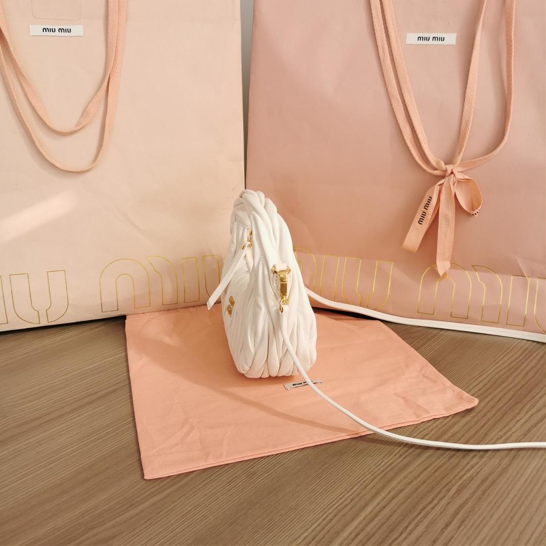 Small size The M familys new mini MiuWander handbag features imported lamb skin classic brand