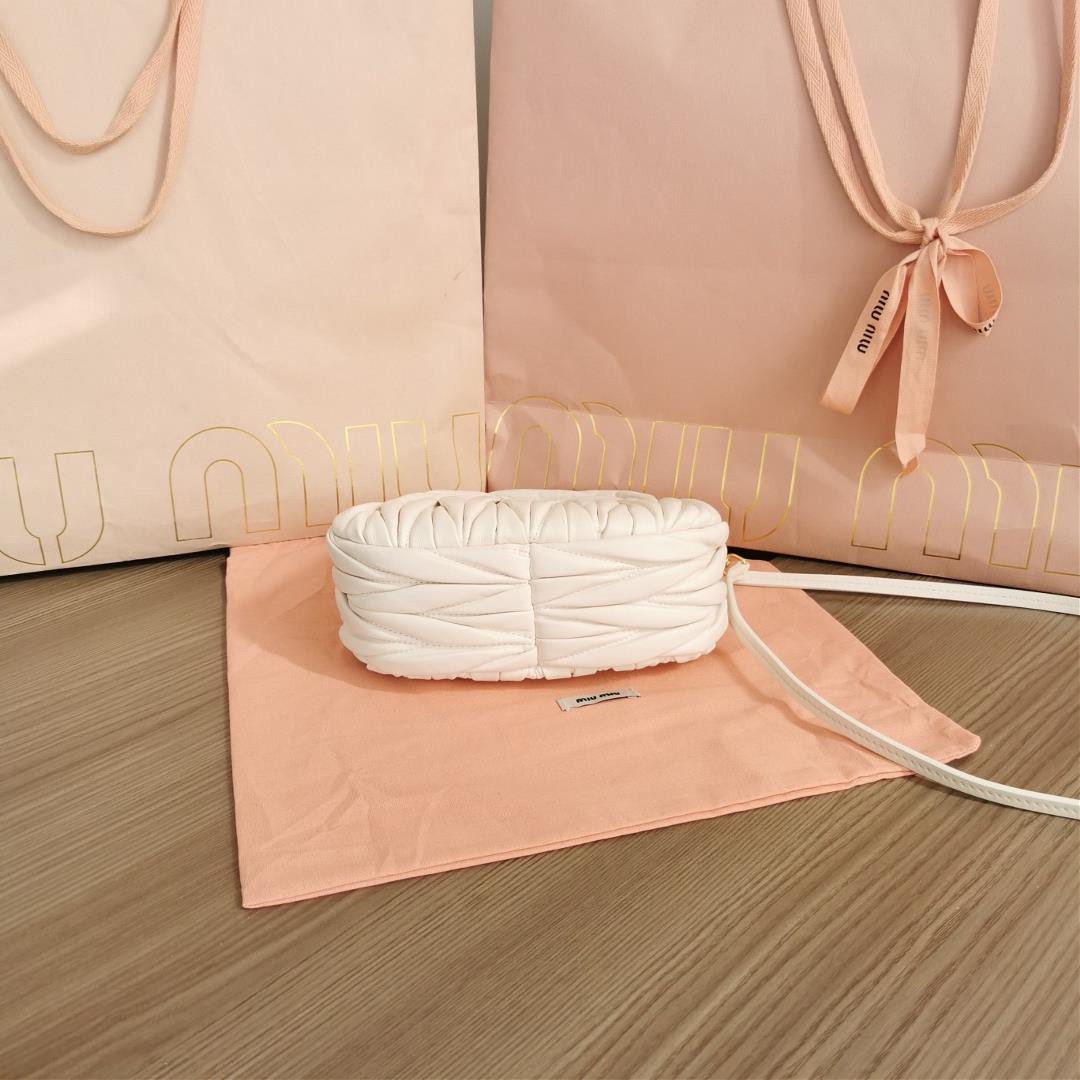 Small size The M familys new mini MiuWander handbag features imported lamb skin classic brand